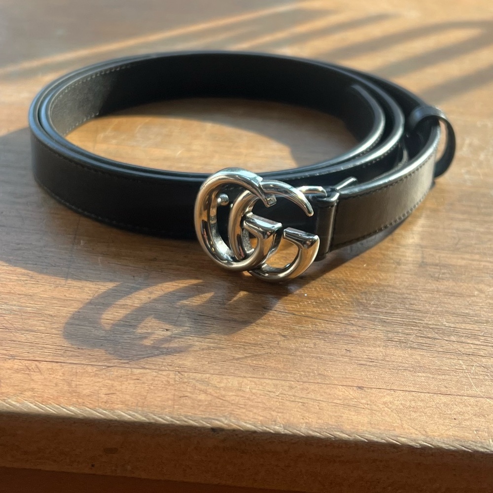 Black and silver Women’s GG Gucci belt 38 inches